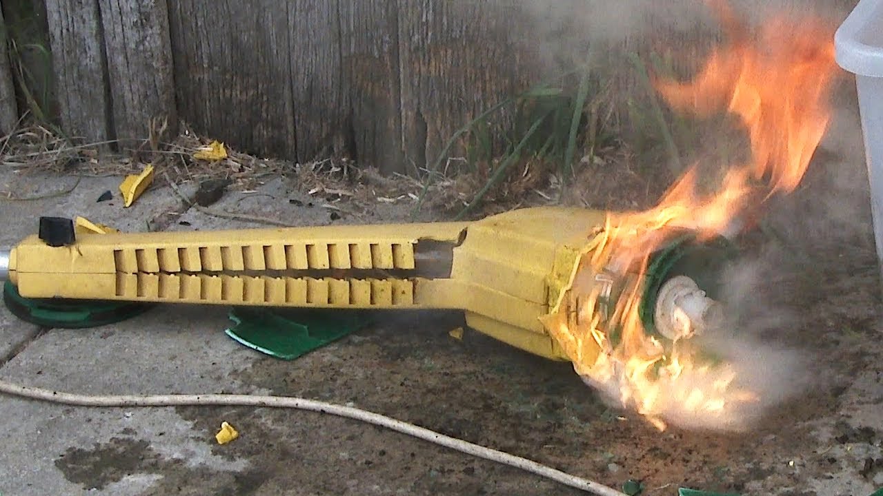 Smashing a Weed Eater 1214.2 Line Trimmer with Motor Fire