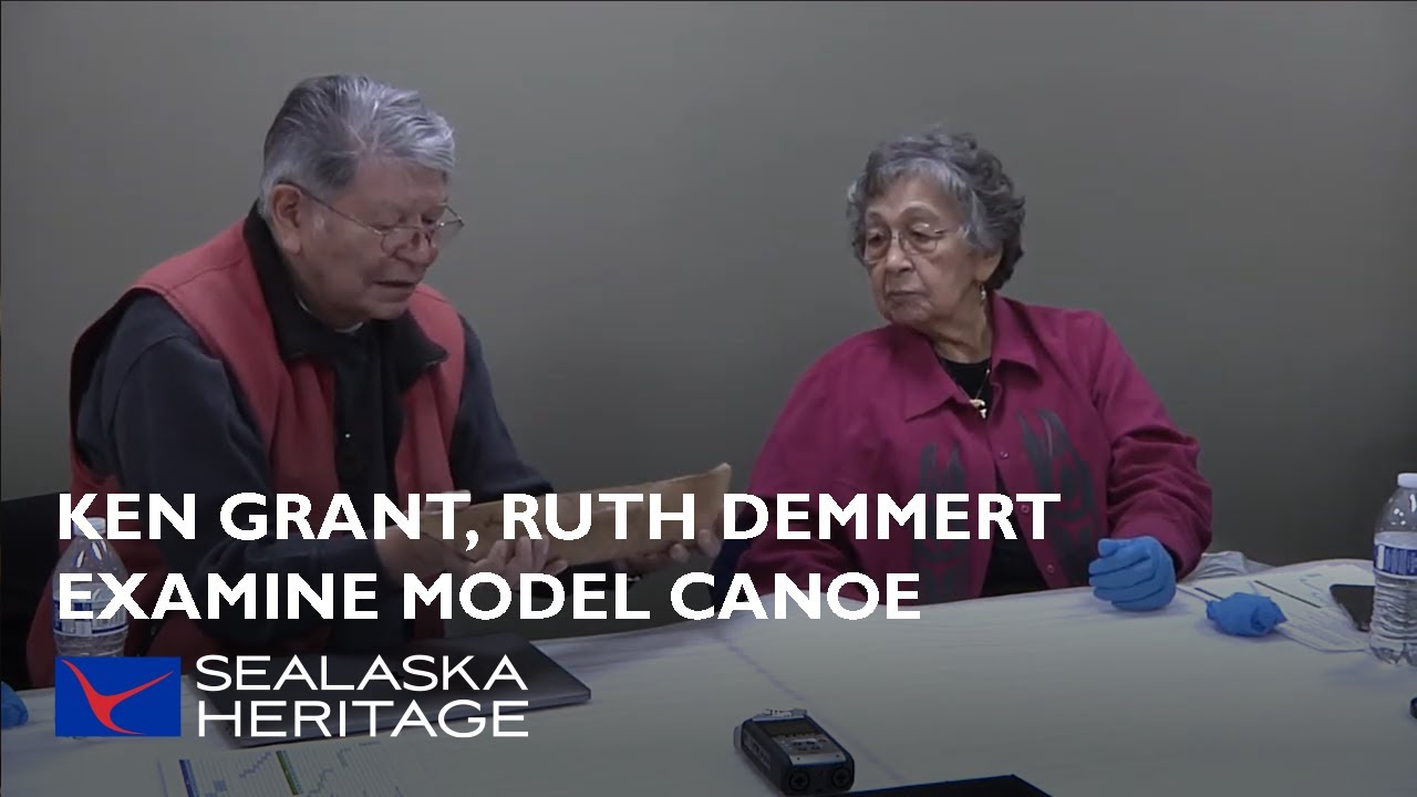 Tlingit Elders Ken Grant, Ruth Demmert Examine Model Canoe
