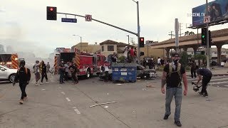 05.30.2020 | 6:00 pm los angeles - protests turned into riots with
officers being attacked and cars lit ablaze along rampant looting,
saturday e...