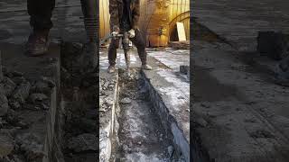 Troughing Process Of Broken Concrete Floor