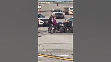 Passenger detained at LAX after opening emergency exit door of airplane