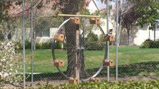 I bought a bike from a garage sale for $10 and used the front wheel for the bird feeder. 8 bolts and some scrap wood later it was 