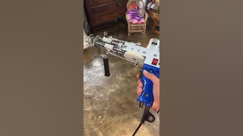 Tufting gun that operates without pressing the trigger