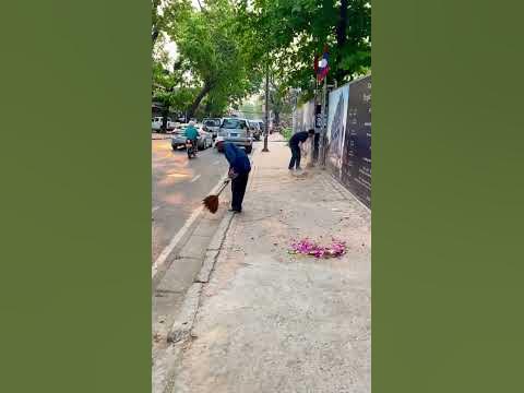 Janitors are sweeping the street early morning in Vientiane #shorts #