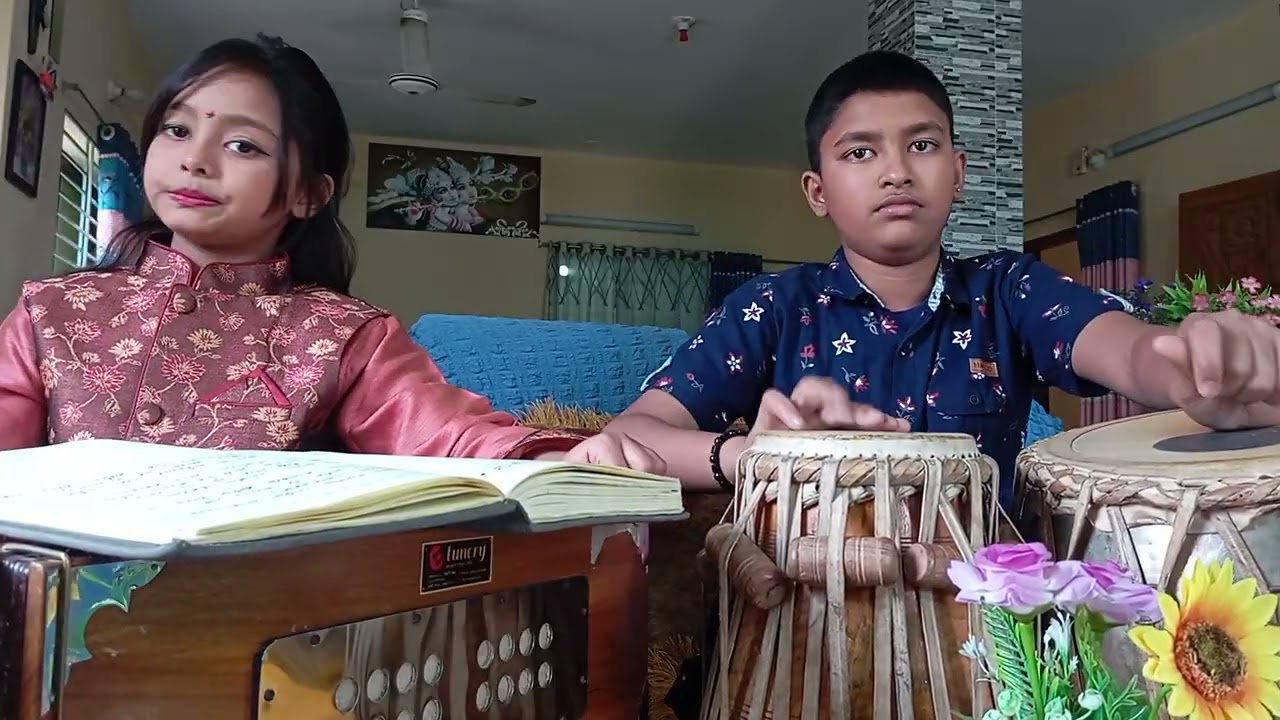 ক‌ম্পিত তনুদল গু‌ঞ্জিত বাদল, পু‌ঞ্জিত শ‌্যামল মালা, কন্ঠঃ অ‌সিরা আচার্য‌্য, সঙ্গতঃ অংশুমান আচার্য‌্য