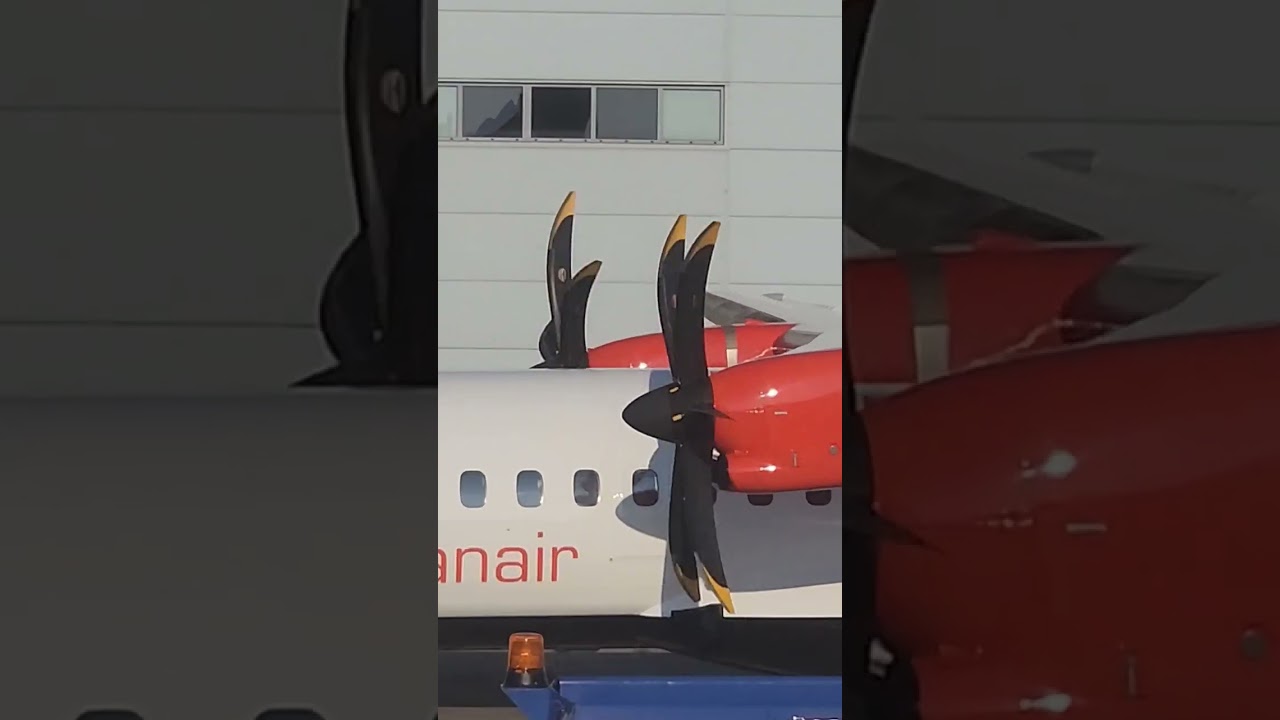 loganair's ATR pulling into Liverpool 