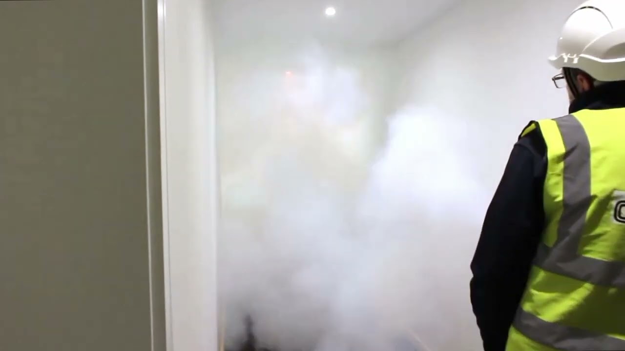A Colt Smoke Control System Clearing a Smoke-Filled Corridor.