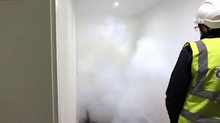 A Colt Smoke Control System Clearing a Smoke-Filled Corridor.