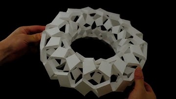 Freeform auxetic mechanisms based on corner-connected tiles