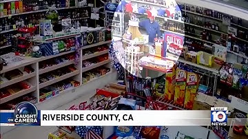 Surveillance video shows store owner shooting at robber