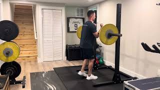 Barbell Zercher Reverse Lunge