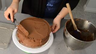 Frosting a Cake with Homemade Chocolate Buttercream by Cookies Cupcakes and Cardio