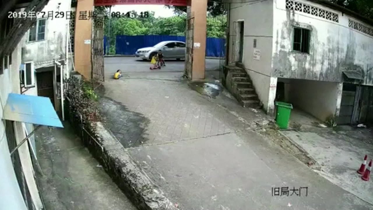 CHINA: TODDLER SURVIVES BEING RUN OVER BY CAR - TWICE! - cnn - YouTube