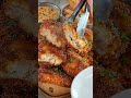 Crispy golden fish sticks served with a side of seasoned fries and a creamy dipping sauce