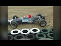 Derek Bell and Sir Jack Brabham battle in F1 Ferrari and McLaren