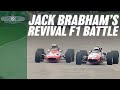 Derek Bell and Sir Jack Brabham battle in F1 Ferrari and McLaren