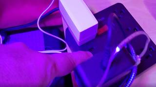Demo of surge suppressor box with ac outlets & USB ports
