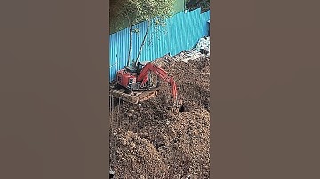 Excavator spreading mud over Foundation #construction #excavator #foundation #highrise #building