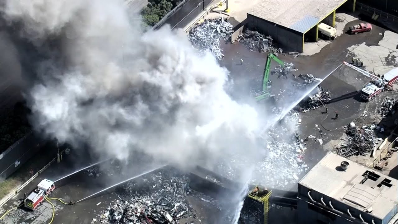 Crews battling large fire at Redwood City metal recycling facility ...