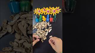 I made an awesome wall hanging out of almond shells and nail polish #shortsfeed #facts #craft