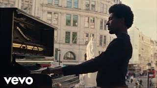 Смотреть клип Jon Batiste - What A Wonderful World