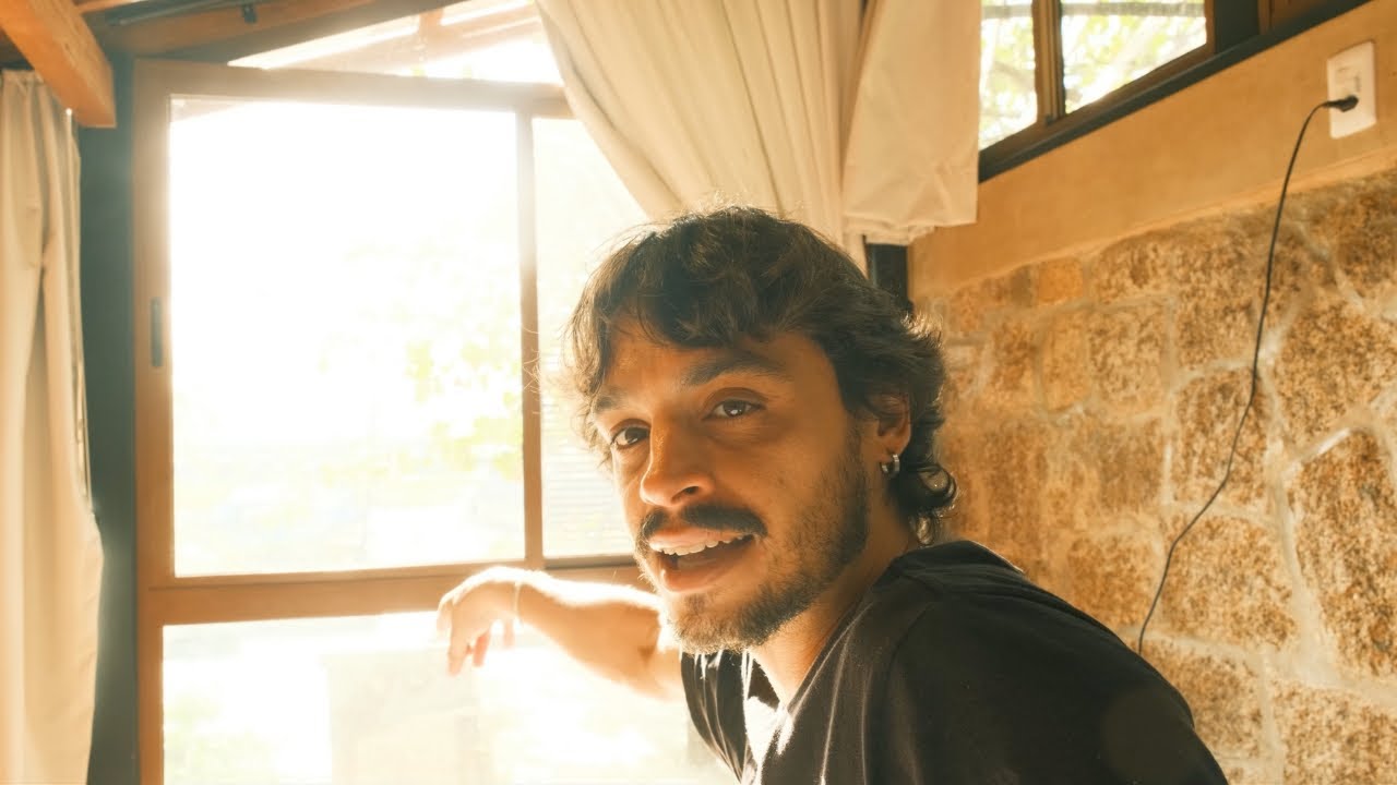 I live in a tiny house by the river in Brazil