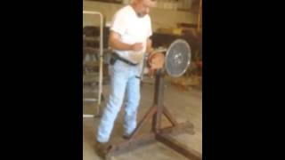 Home made automotive rotisserie made from Chevy truck hubs.