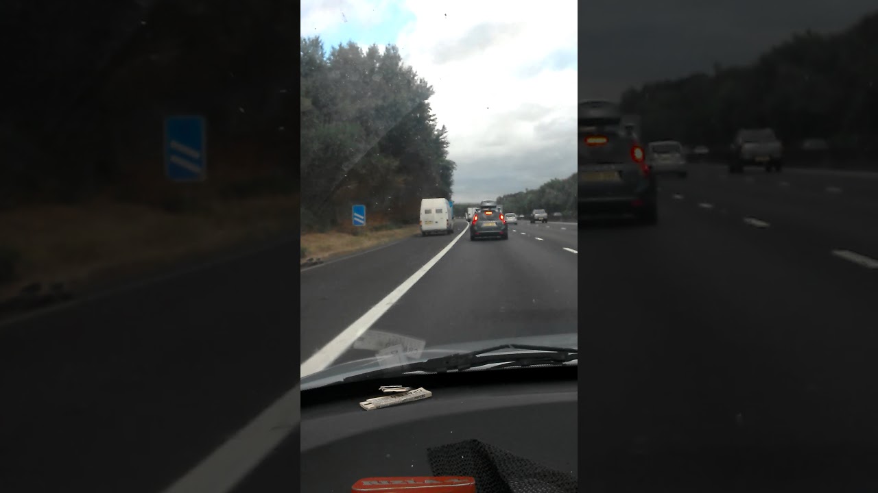 driver on hard shoulder