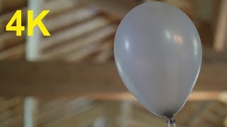 4K Free Stock Footage: Hovering Grey Balloon