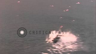 Strafing Japanese Sampan boat  and Japanese Navy's flying boat 'Emily' in Okinawa...HD Stock Footage