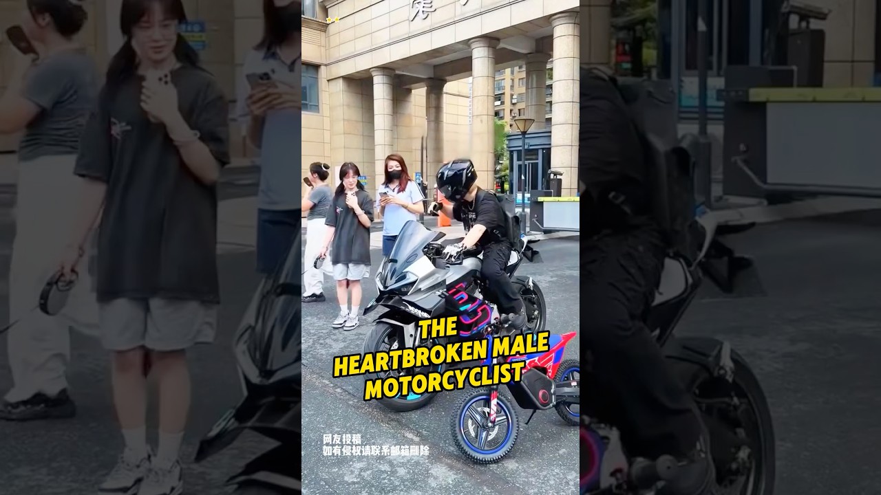 The heartbroken male motorcyclist