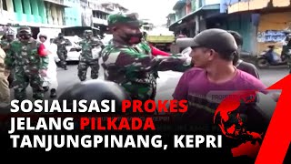 Penyemprotan dan Pembagian Masker di Titik Kerumunan Jelang Pilkada di Tanjungpinang | tvOne screenshot 3