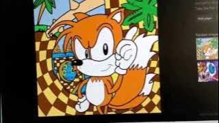 dic movies logo tails has his legs crossed and one arm on his hip