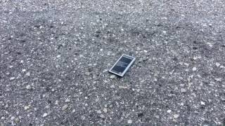 Puncturing a lithium phone battery.