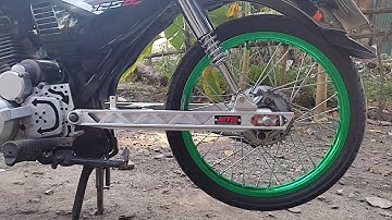 Installing plus 2 swing arm for tmx 125 / stock hud
