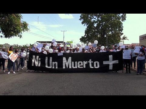 Hundreds take to streets in Venezuela over murders of three women in one week