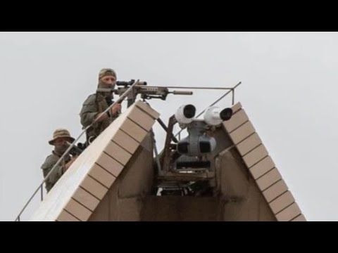 Police snipers at Sydney Opera House memorial sparks debate