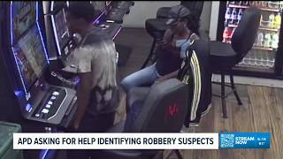 APD searching for suspects in robbery