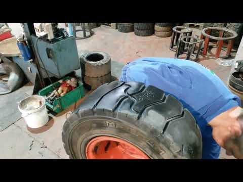 Guy cut threads in a forklift tire are (Extremely satisfying).