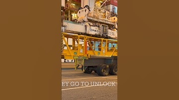 Extreme Heights: Longshoremen Unlock 6 High Containers Using the Emergency Man Basket
