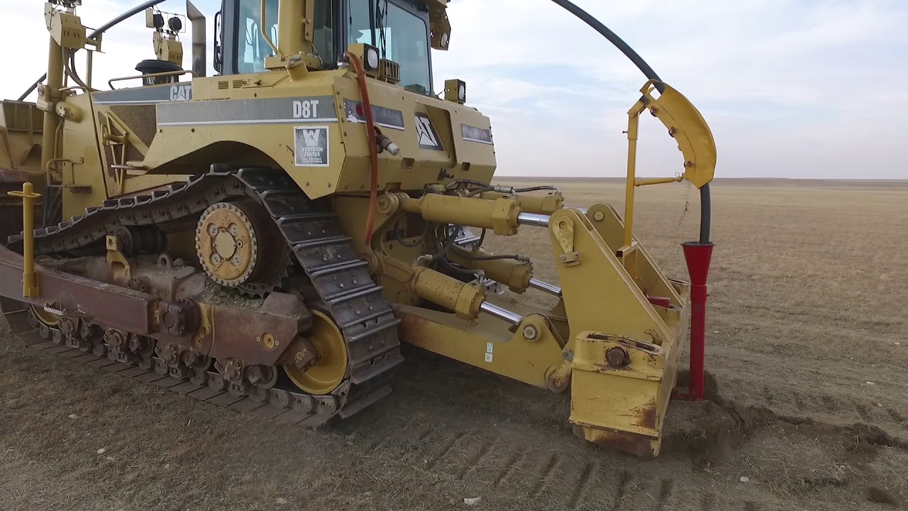 Laying Pipe, CAT D8 - 2