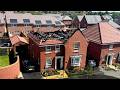 Moment solar panels on £600k house go up in flames with family inside | SWNS