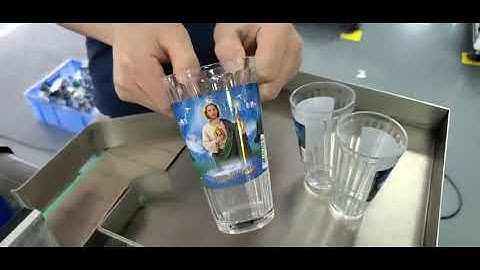 auto model conic glass bottle labeling machine test video .mp4