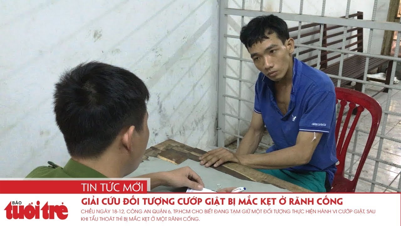 Giải cứu đối tượng cướp giật bị mắc kẹt ở rãnh cống - YouTube