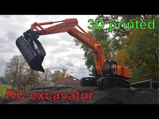Hitachi Zaxis 670 - first test of tilting slope bucket - YouTube