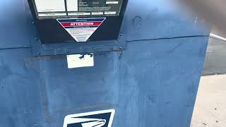 Sending Letters Through the Blue Collection Mailbox at the USPS Tyler, Texas.