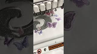 Embroidering a butterfly birthday shirt #customclothing #embroidery #embroiderybusiness