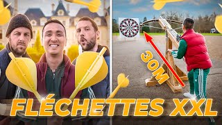 Fléchettes XXL devant un château (avec une arbalète géante)