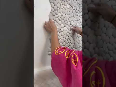 Video: Decorative stone effect tiles for interior decoration: features and ideas