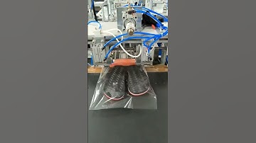 Automatic slipper horizontal bag inserting sealing packaging machine